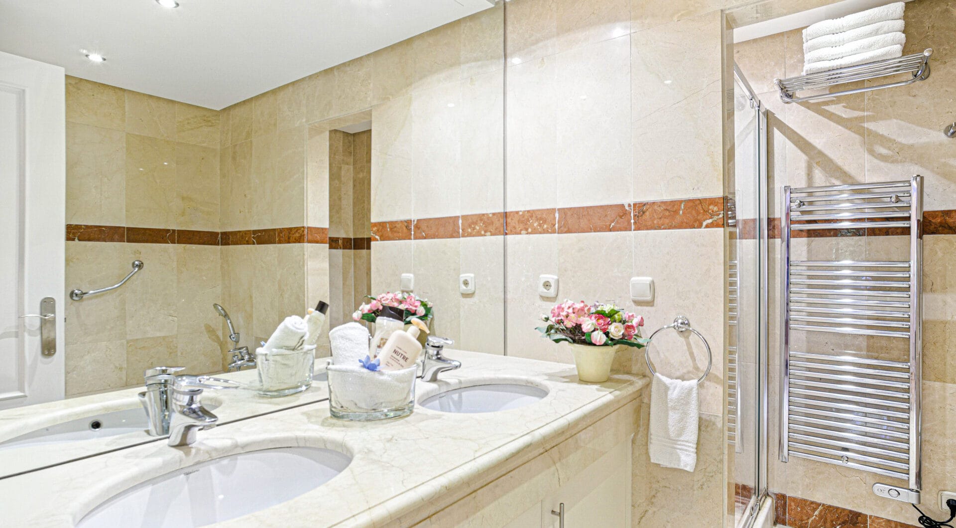 Immaculate three bedroom west facing ground floor apartment in the prestigious and gated beachfront community Menara Beach