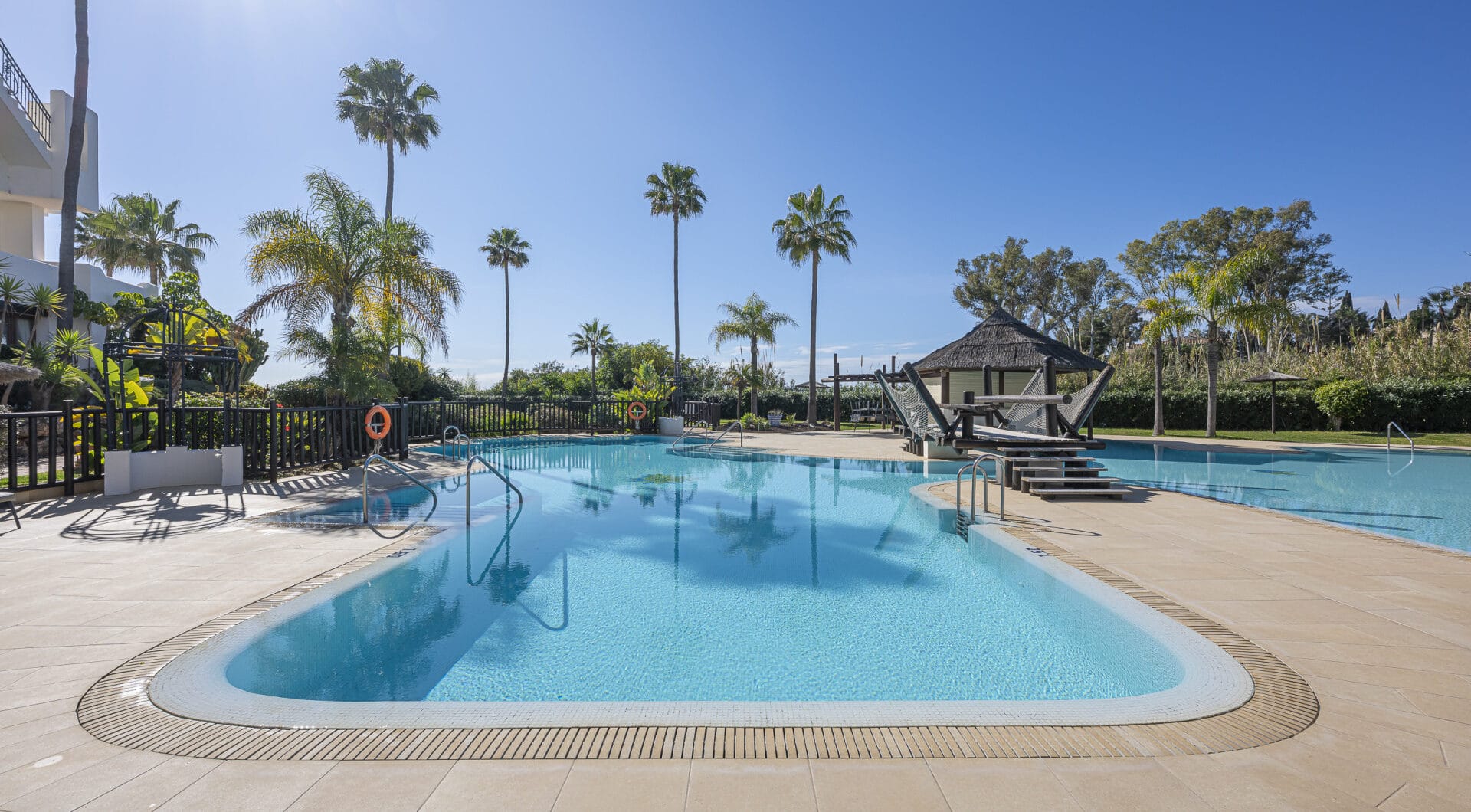 Beautifully renovated, south facing three-bedroom apartment located  in the prestigious gated community of Bahia del Velerin, Estepona