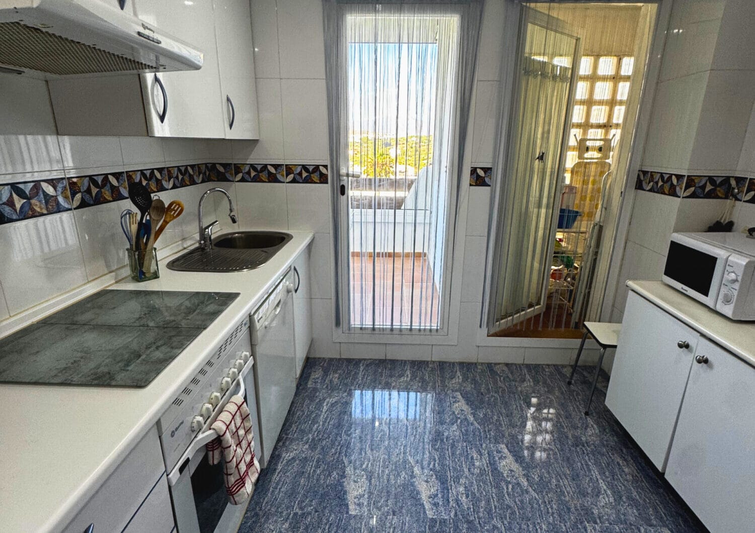 Spacious 3-Bedroom Apartment with Three Terraces, Sea Views, Double Garage &amp; Storage