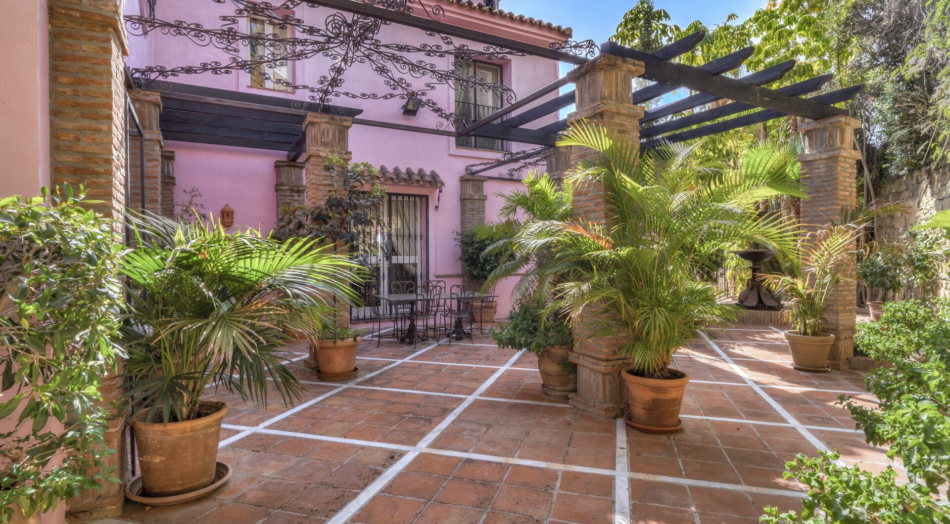 Charming five-bedroom Andalusian style villa in the gated community Puerto de Los Almendros, Benahavis with guest apartment