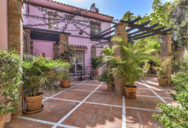 Charming five-bedroom Andalusian style villa in the gated community Puerto de Los Almendros, Benahavis with guest apartment
