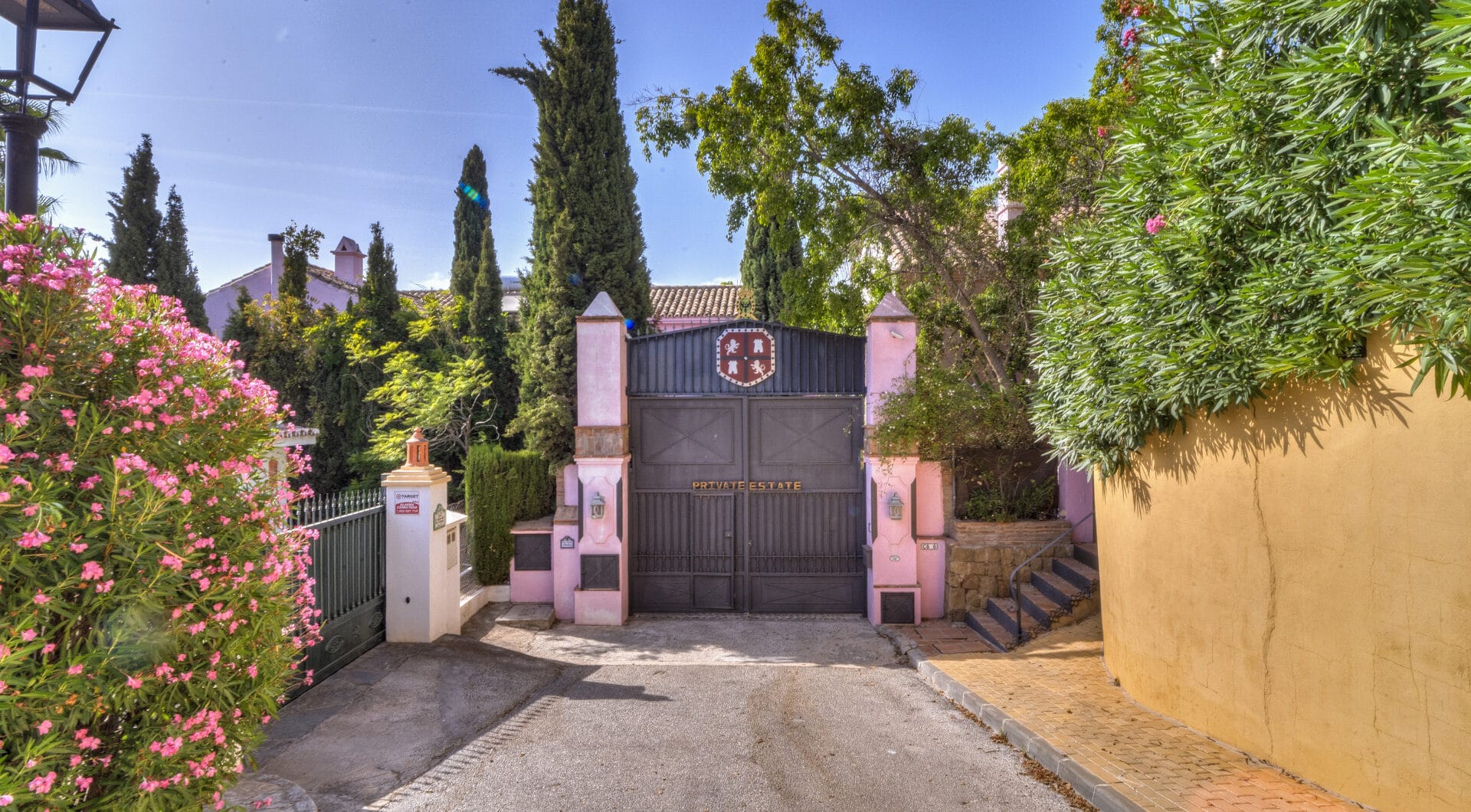Charming five-bedroom Andalusian style villa in the gated community Puerto de Los Almendros, Benahavis with guest apartment