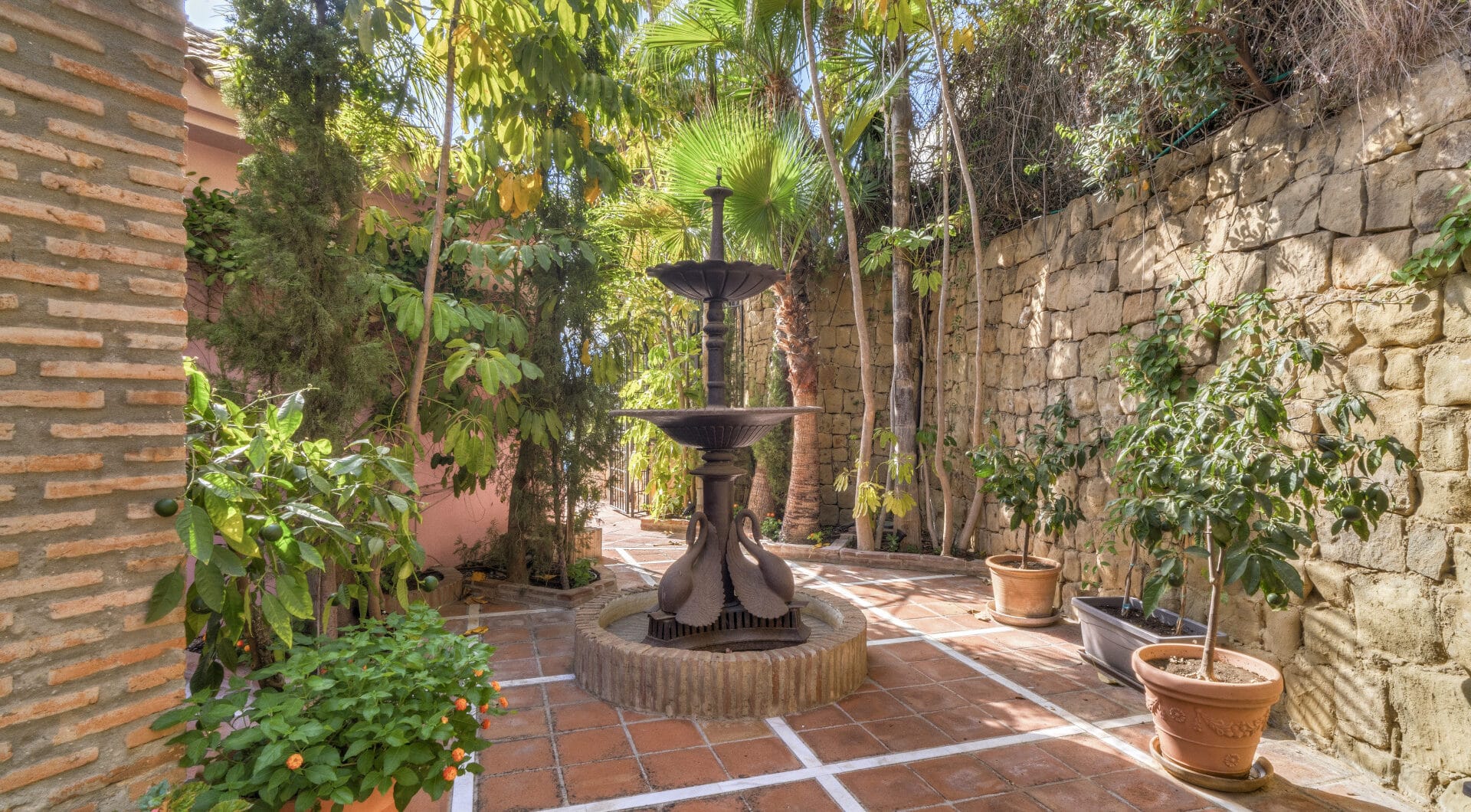Charming five-bedroom Andalusian style villa in the gated community Puerto de Los Almendros, Benahavis with guest apartment