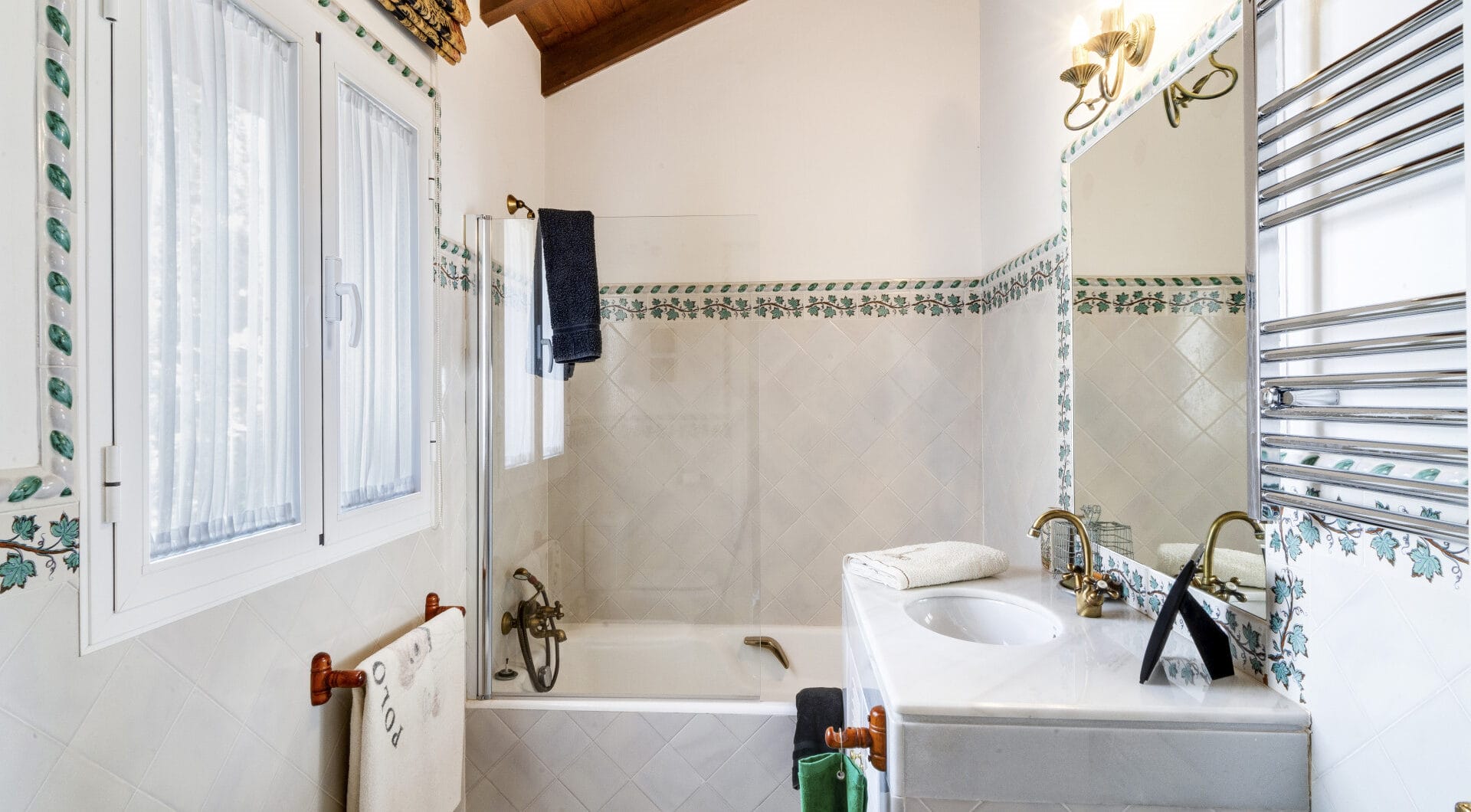 Charming five-bedroom Andalusian style villa in the gated community Puerto de Los Almendros, Benahavis with guest apartment