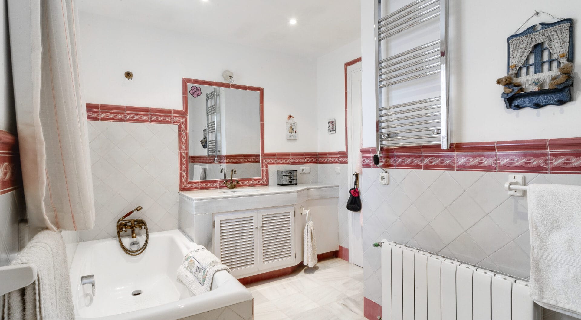 Charming five-bedroom Andalusian style villa in the gated community Puerto de Los Almendros, Benahavis with guest apartment