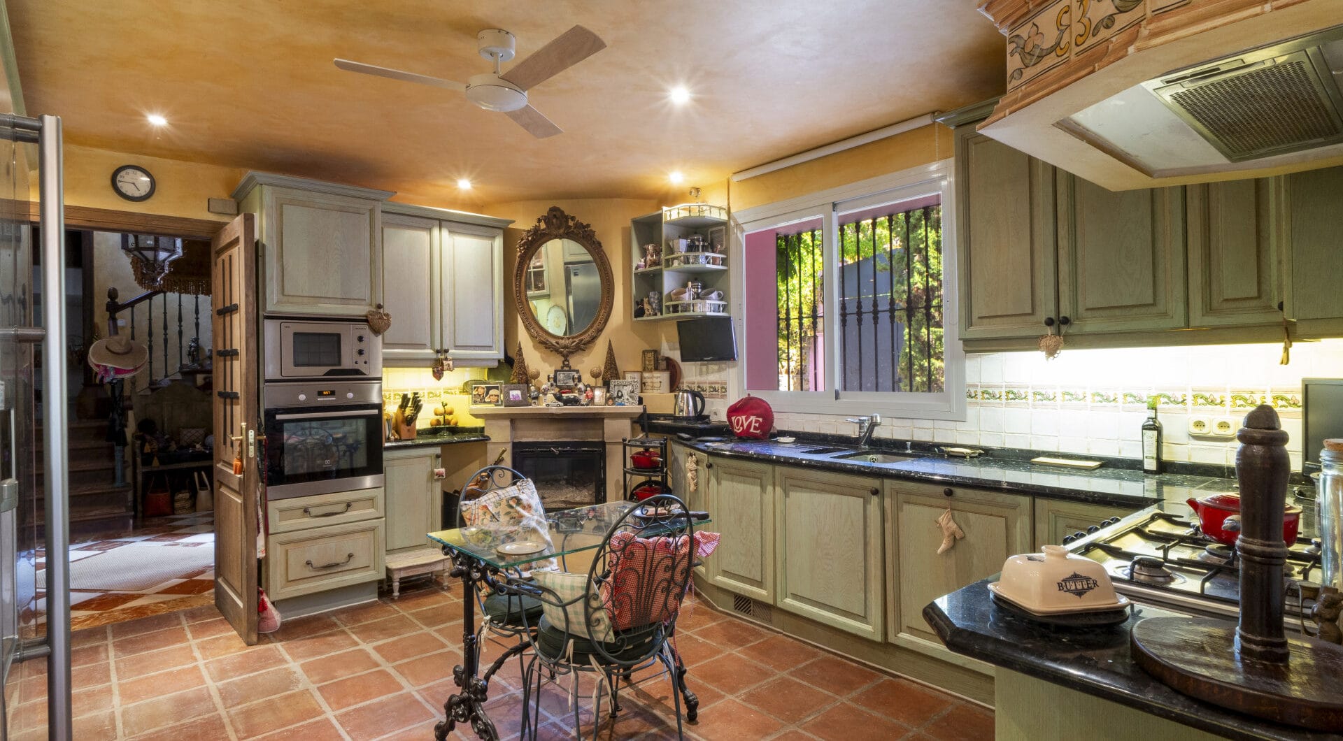 Charming five-bedroom Andalusian style villa in the gated community Puerto de Los Almendros, Benahavis with guest apartment