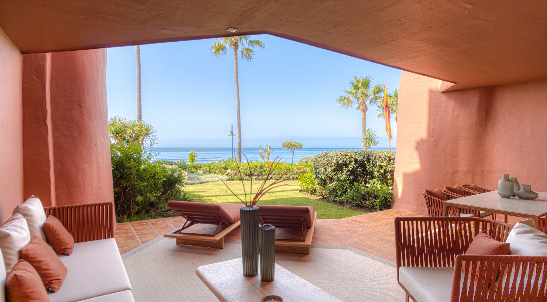 Impeccably renovated, south facing beach front, garden apartment located in the exclusive Menara Beach community on the sought-after New Golden Mile