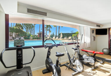Impeccably renovated, south facing beach front, garden apartment located in the exclusive Menara Beach community on the sought-after New Golden Mile