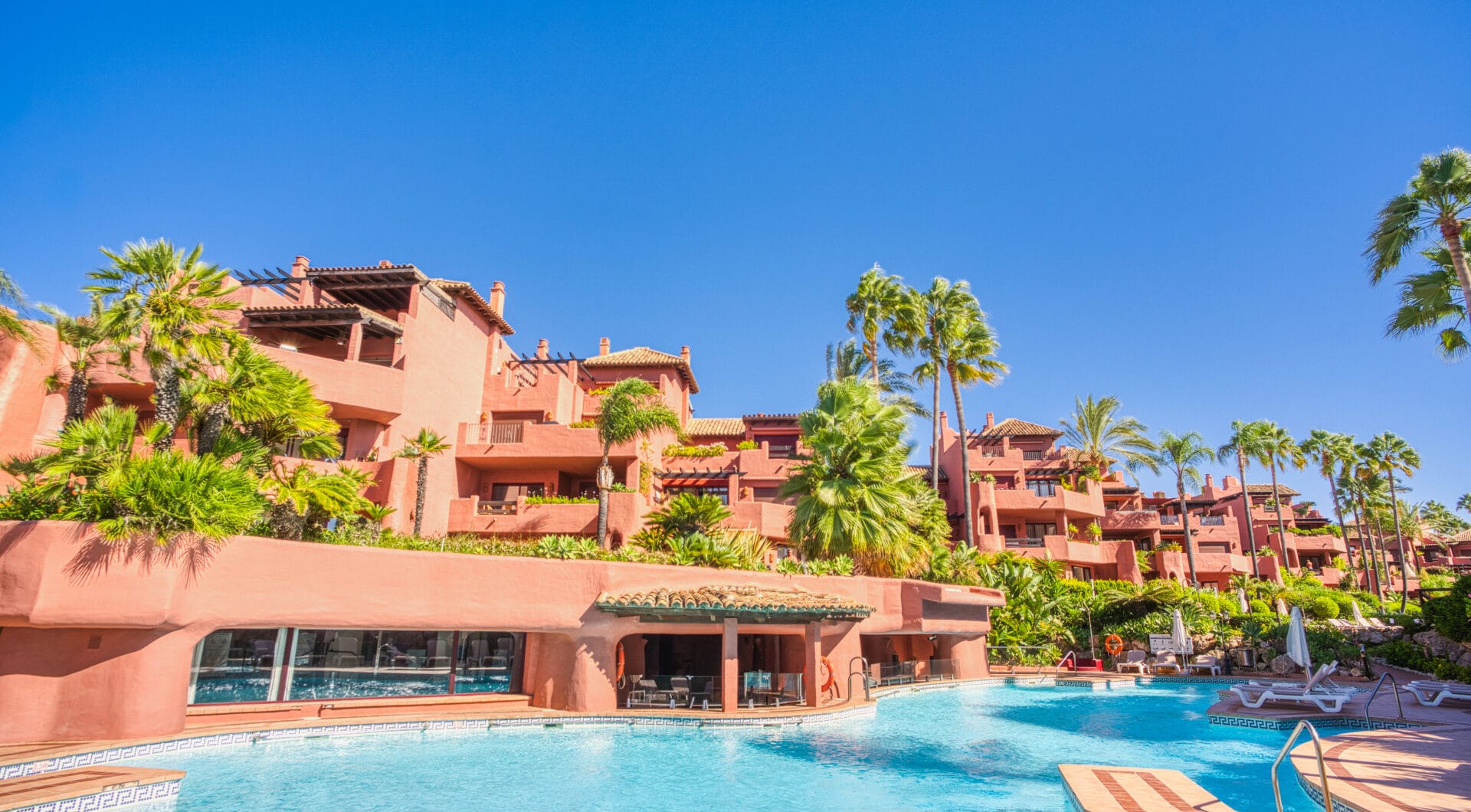 Impeccably renovated, south facing beach front, garden apartment located in the exclusive Menara Beach community on the sought-after New Golden Mile