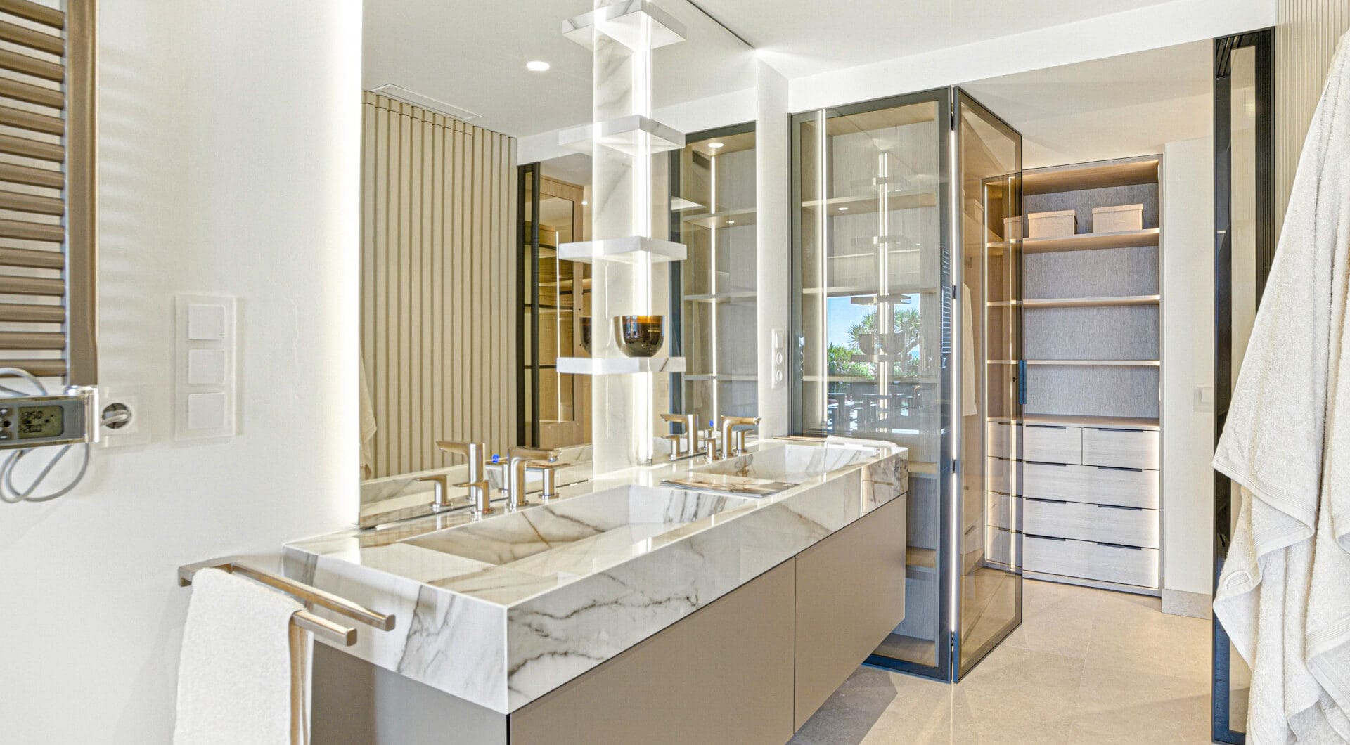 Impeccably renovated, south facing beach front, garden apartment located in the exclusive Menara Beach community on the sought-after New Golden Mile