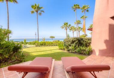 Impeccably renovated, south facing beach front, garden apartment located in the exclusive Menara Beach community on the sought-after New Golden Mile