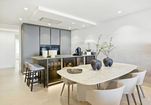 Impeccably renovated, south facing beach front, garden apartment located in the exclusive Menara Beach community on the sought-after New Golden Mile