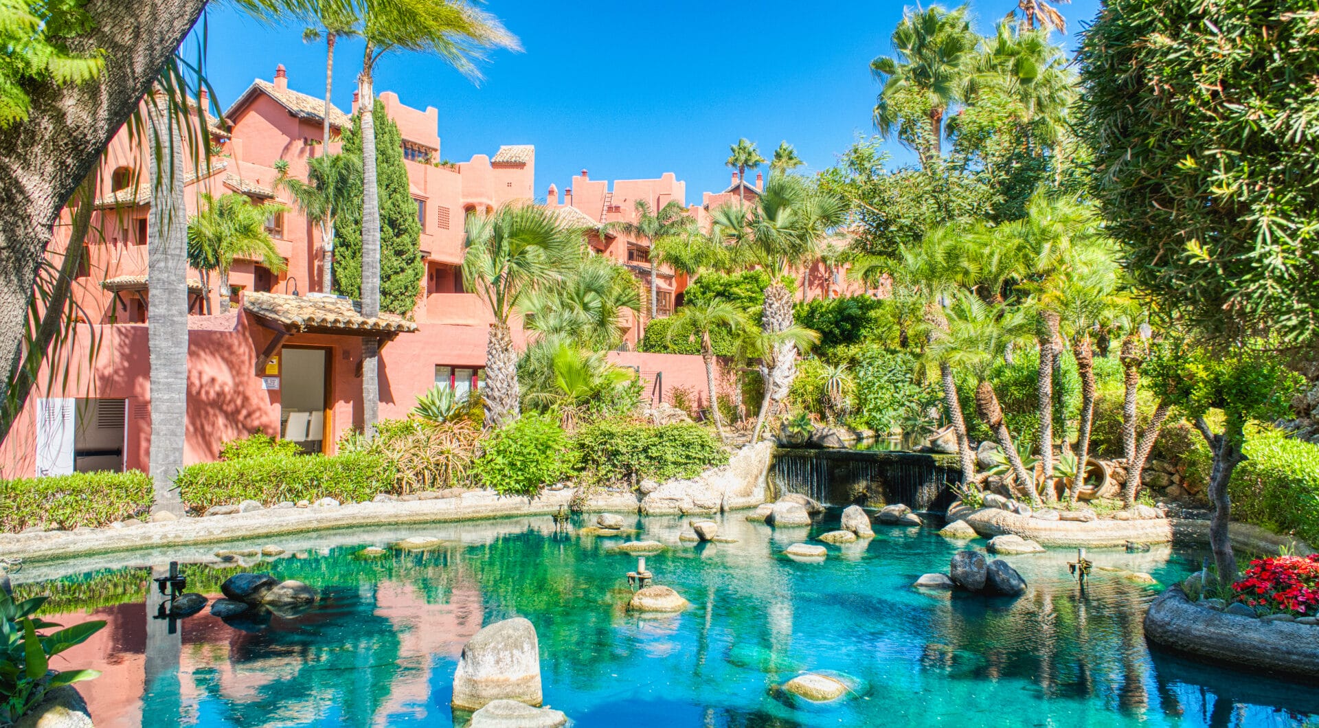 Impeccably renovated, south facing beach front, garden apartment located in the exclusive Menara Beach community on the sought-after New Golden Mile