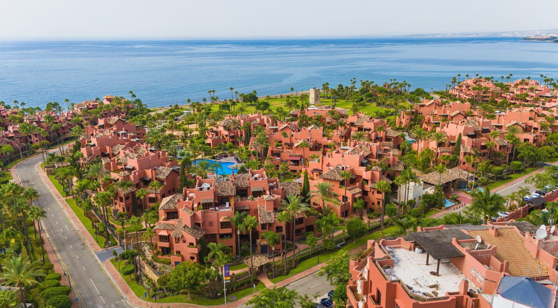 Impeccably renovated, south facing beach front, garden apartment located in the exclusive Menara Beach community on the sought-after New Golden Mile