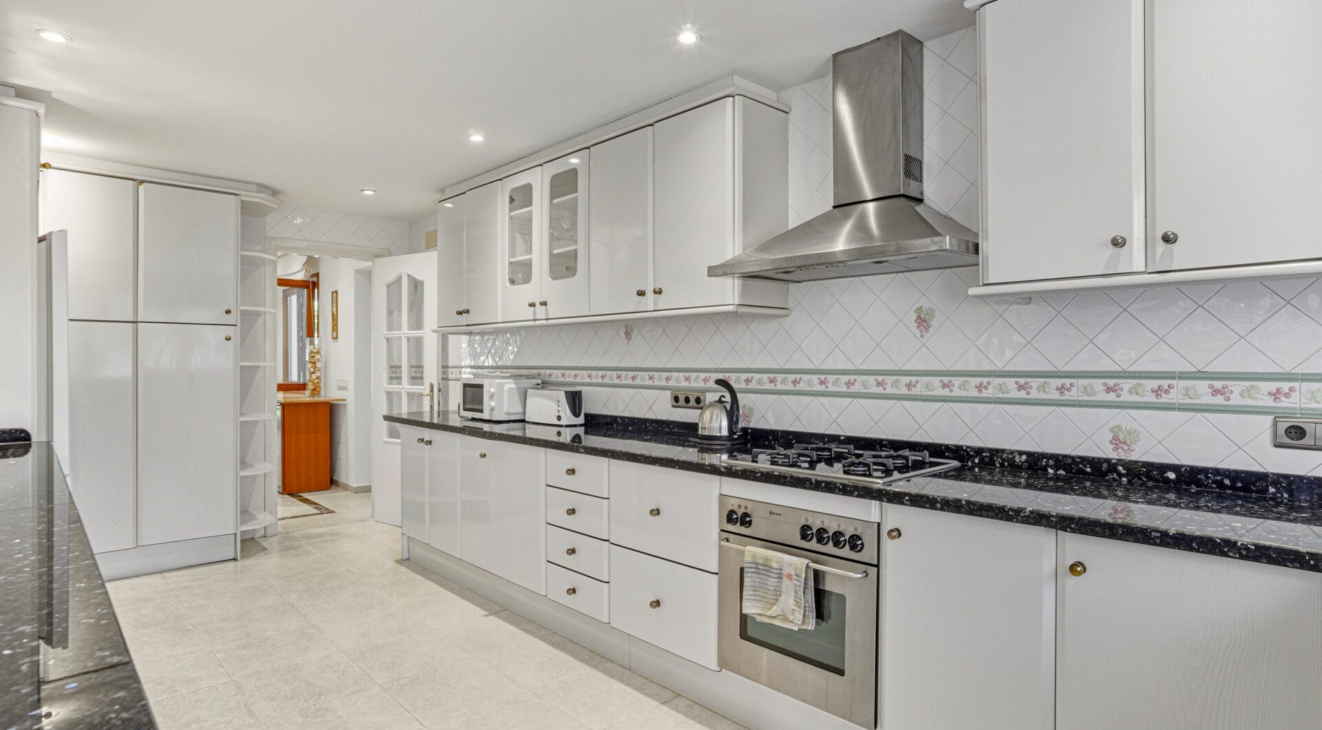 Elegant, southeast facing five bedroom Villa located on the New Golden Mile in Estepona, just steps from the beach