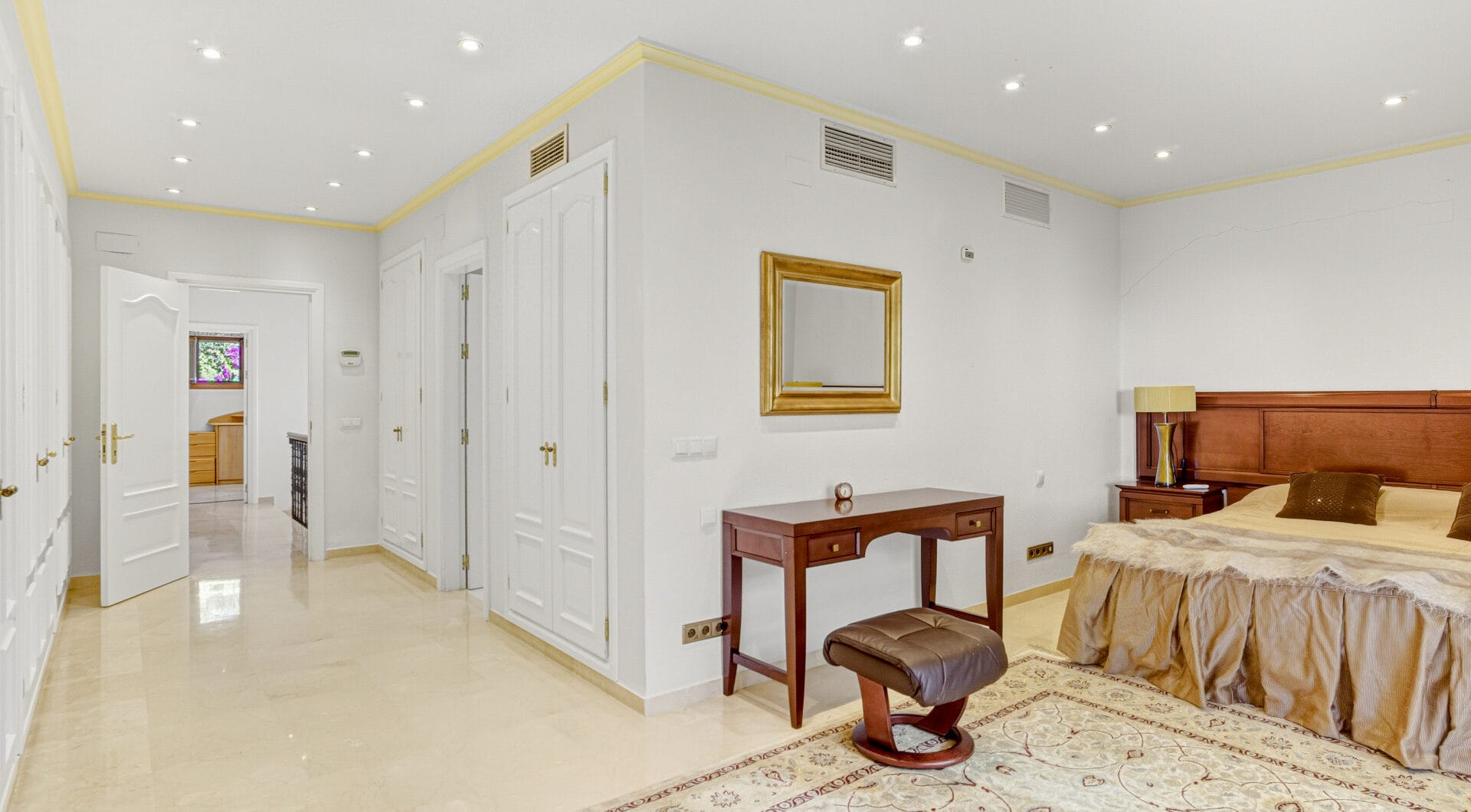Elegant, southeast facing five bedroom Villa located on the New Golden Mile in Estepona, just steps from the beach