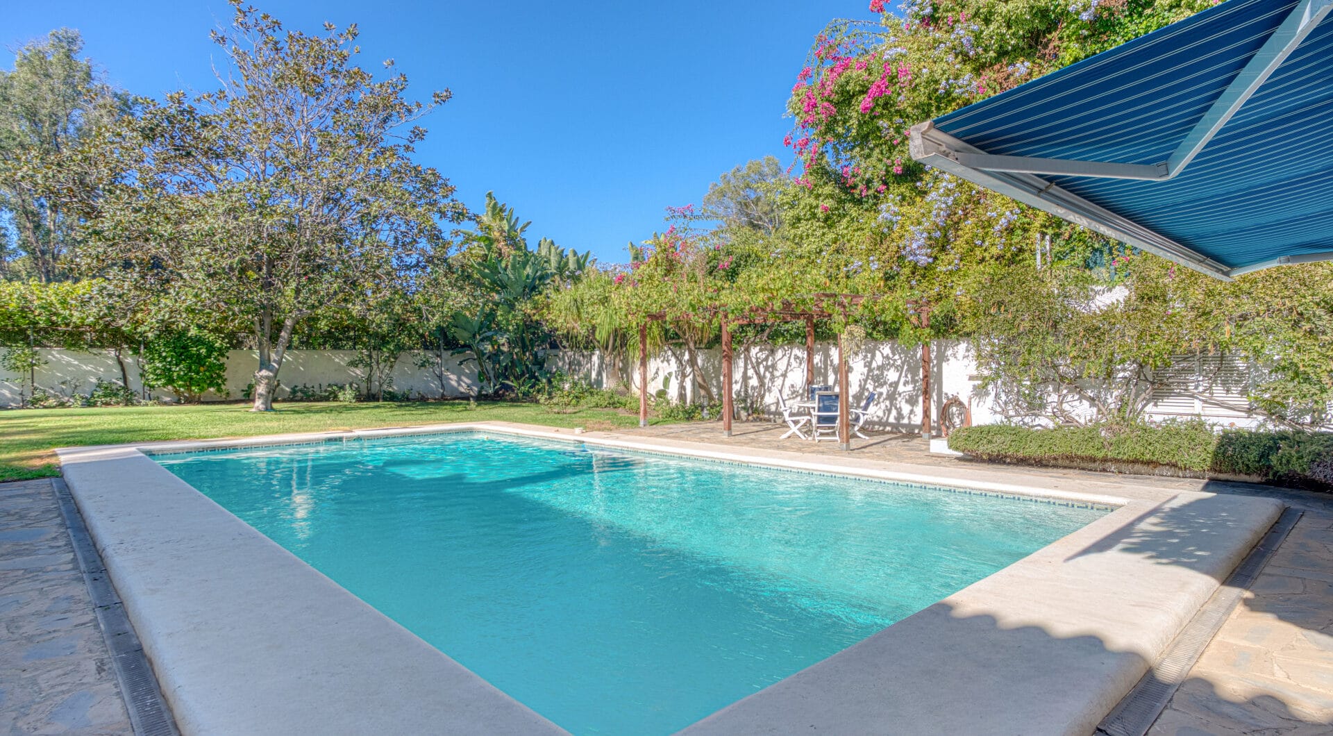 Elegant, southeast facing five bedroom Villa located on the New Golden Mile in Estepona, just steps from the beach