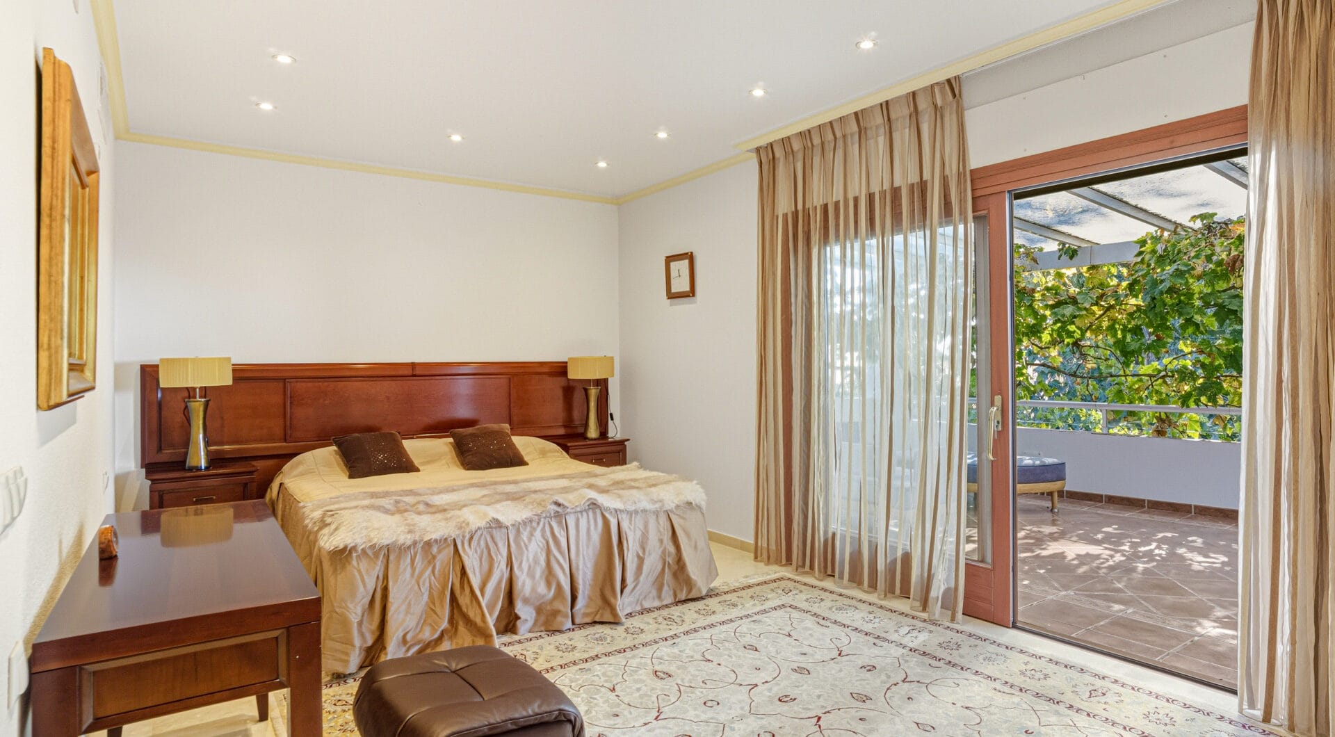 Elegant, southeast facing five bedroom Villa located on the New Golden Mile in Estepona, just steps from the beach