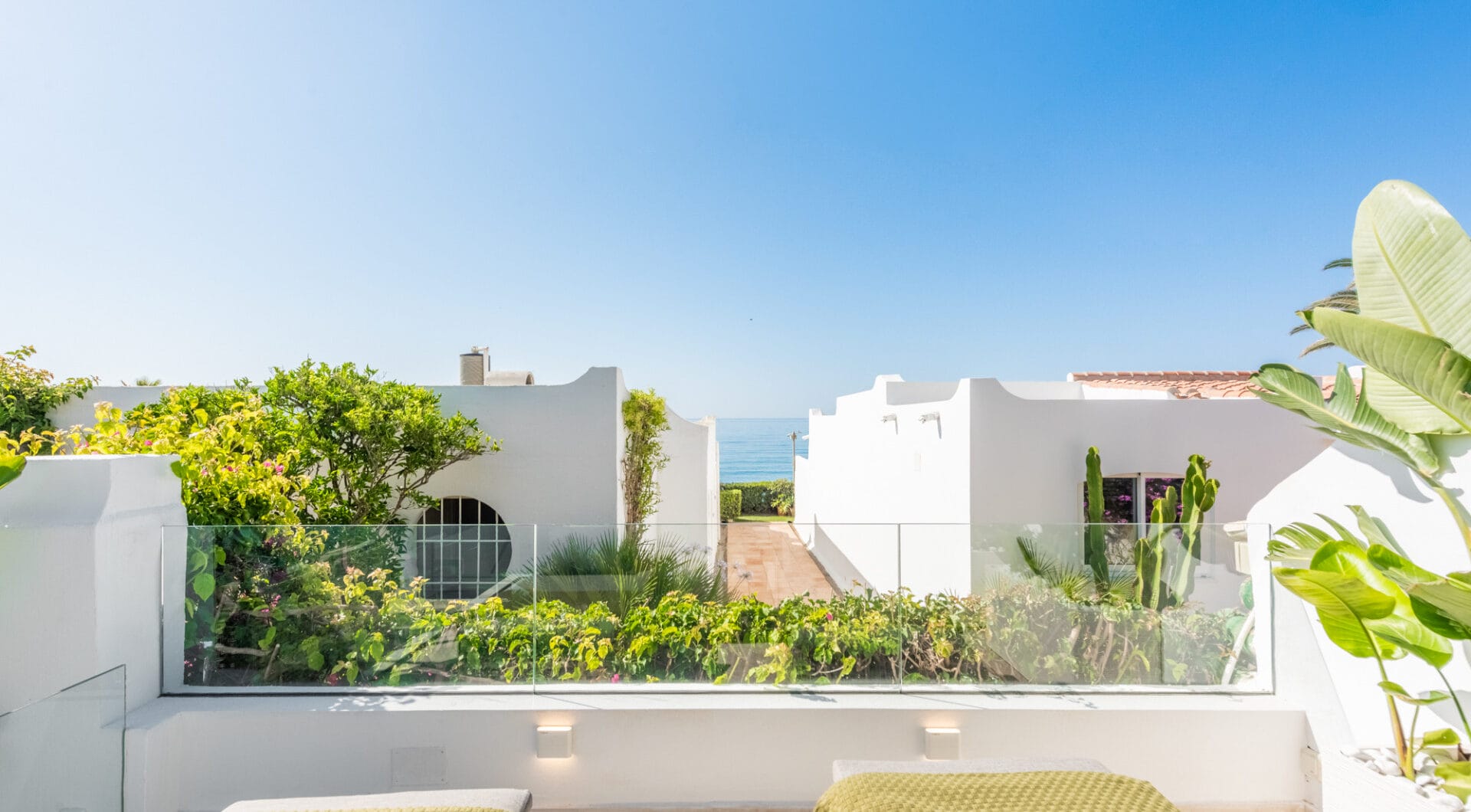 Scandi-style design bungalow in the beachfront Oasis Club on Marbella's Golden Mile.
