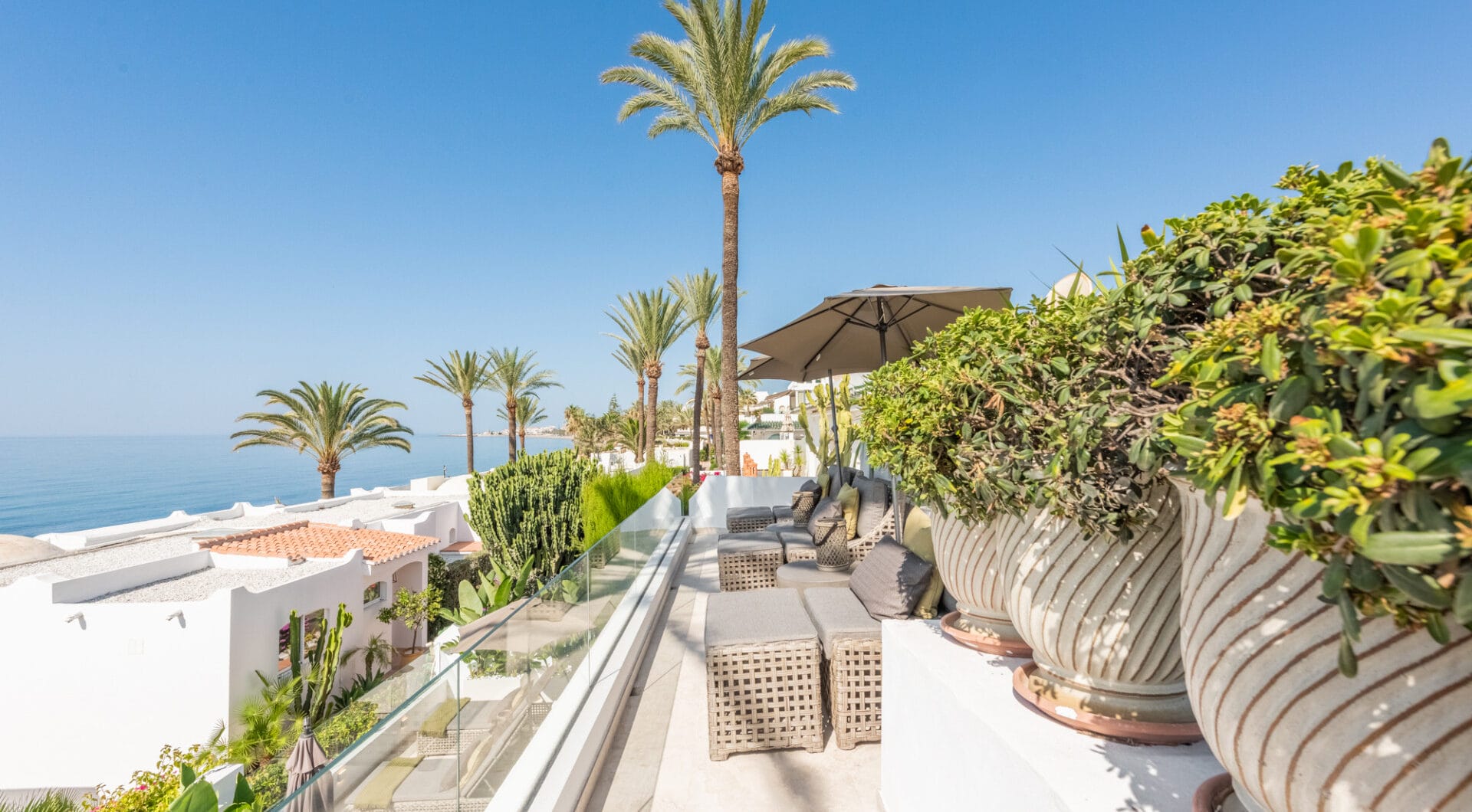 Scandi-style design bungalow in the beachfront Oasis Club on Marbella's Golden Mile.