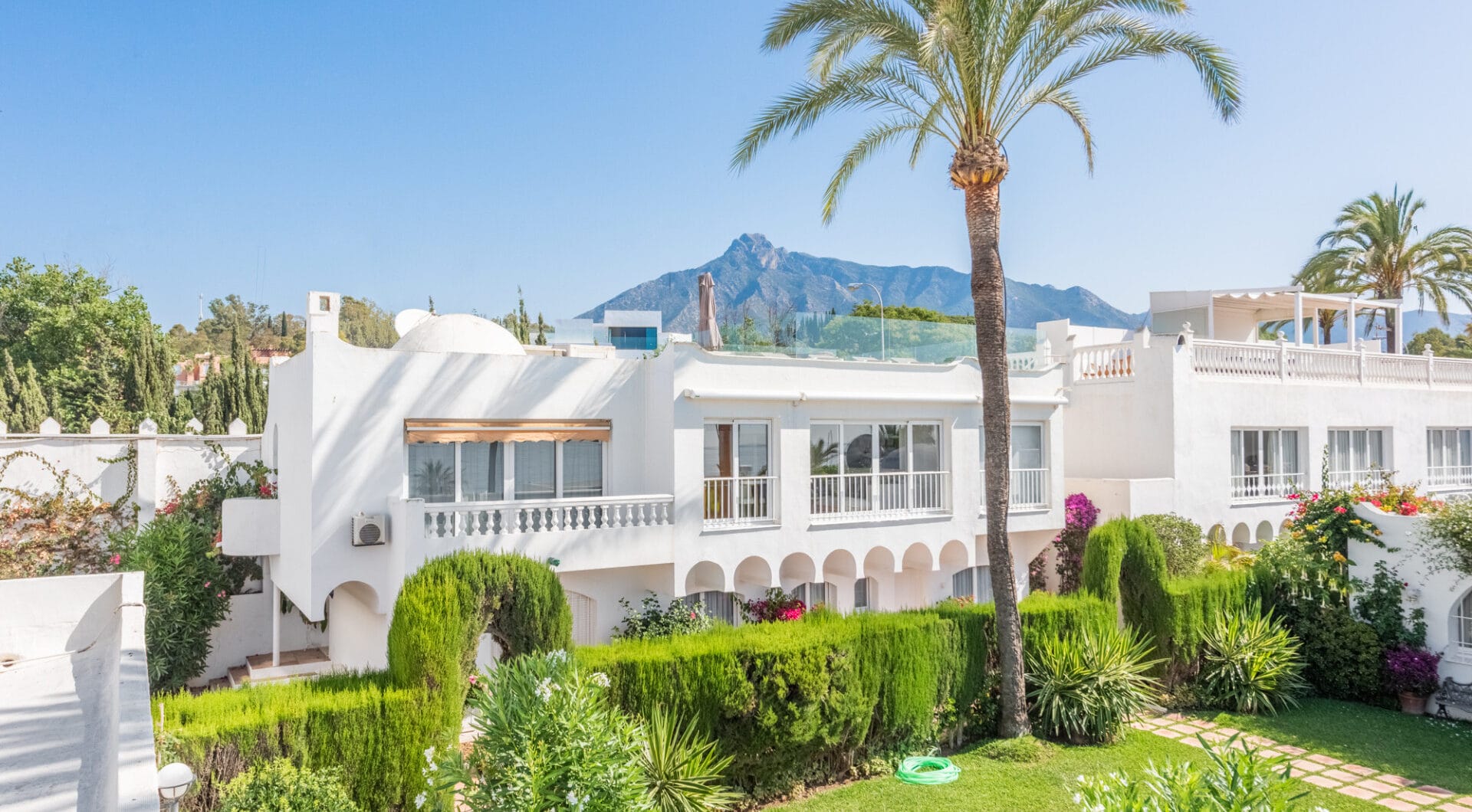 Scandi-style design bungalow in the beachfront Oasis Club on Marbella's Golden Mile.