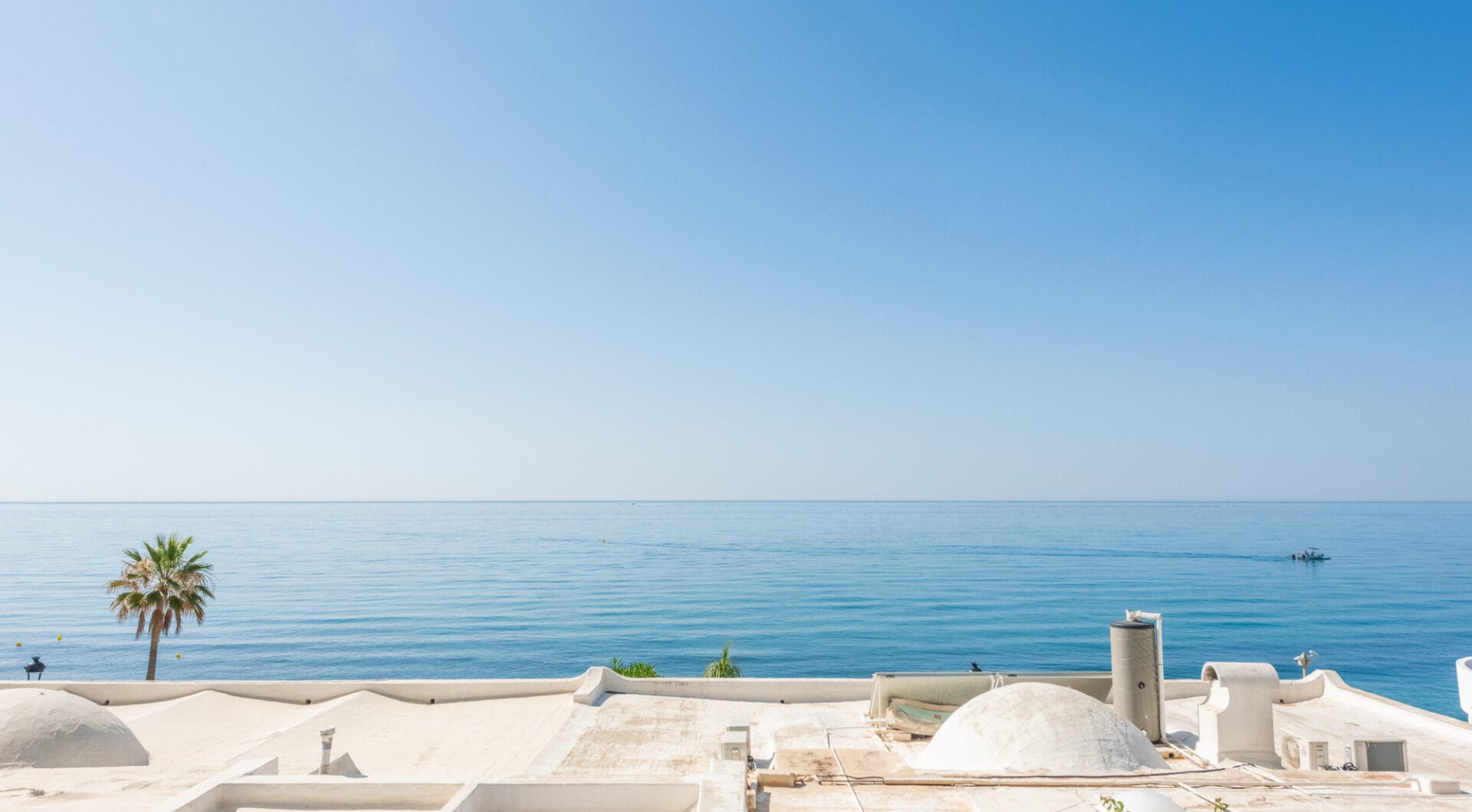 Scandi-style design bungalow in the beachfront Oasis Club on Marbella's Golden Mile.