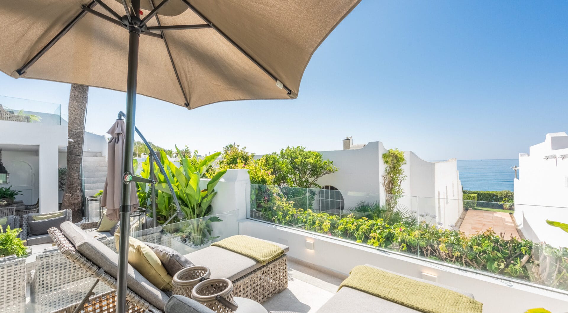 Scandi-style design bungalow in the beachfront Oasis Club on Marbella's Golden Mile.