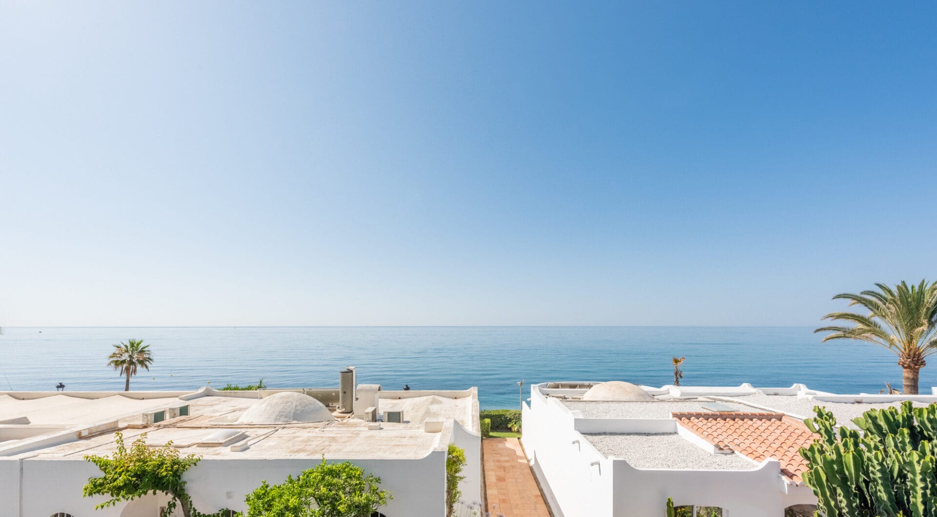 Scandi-style design bungalow in the beachfront Oasis Club on Marbella's Golden Mile.