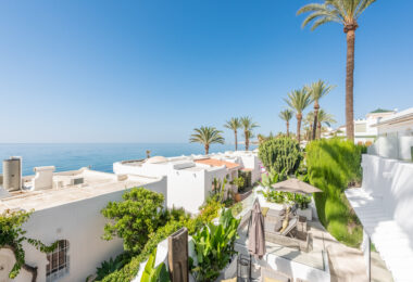 Scandi-style design bungalow in the beachfront Oasis Club on Marbella's Golden Mile.