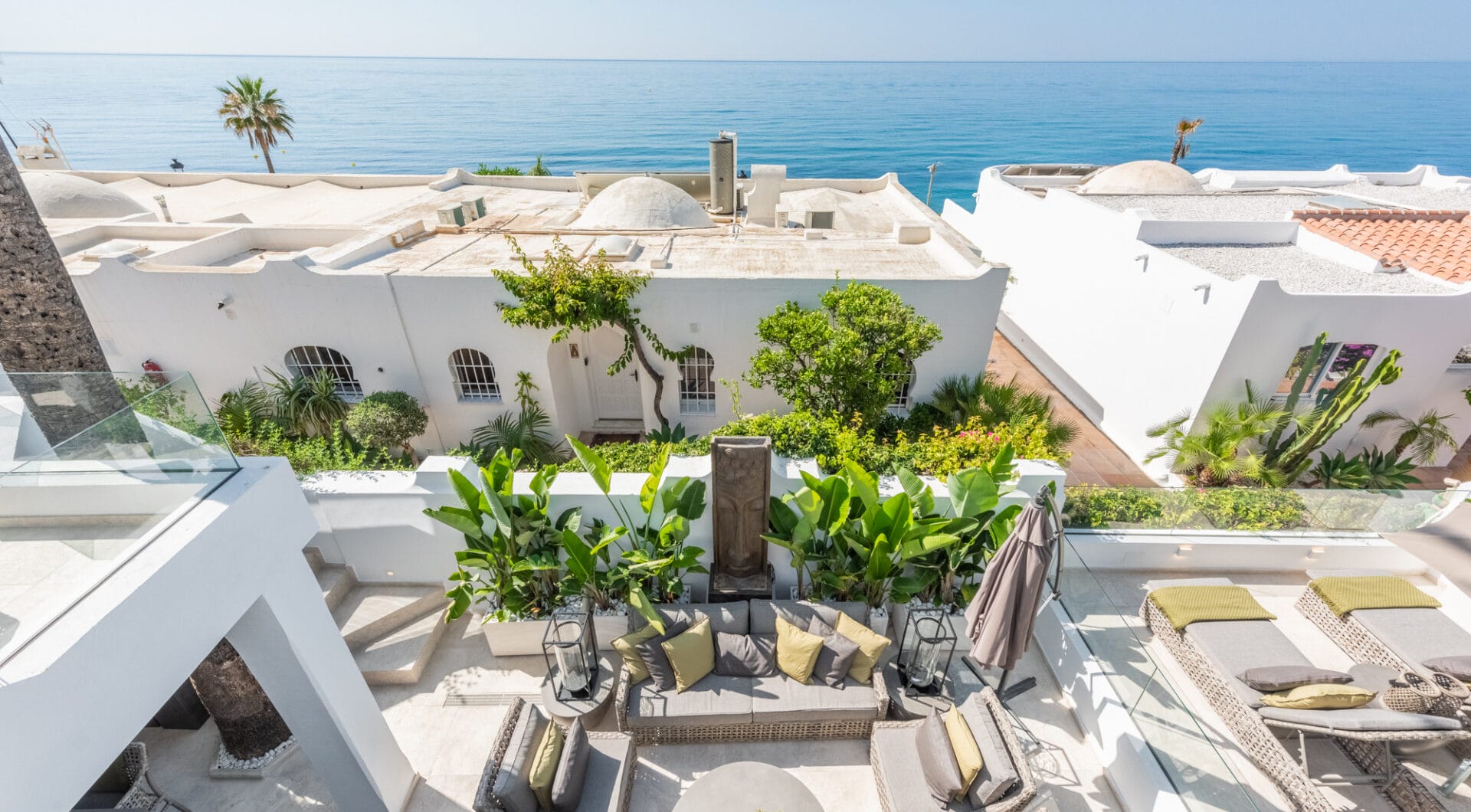 Scandi-style design bungalow in the beachfront Oasis Club on Marbella's Golden Mile.