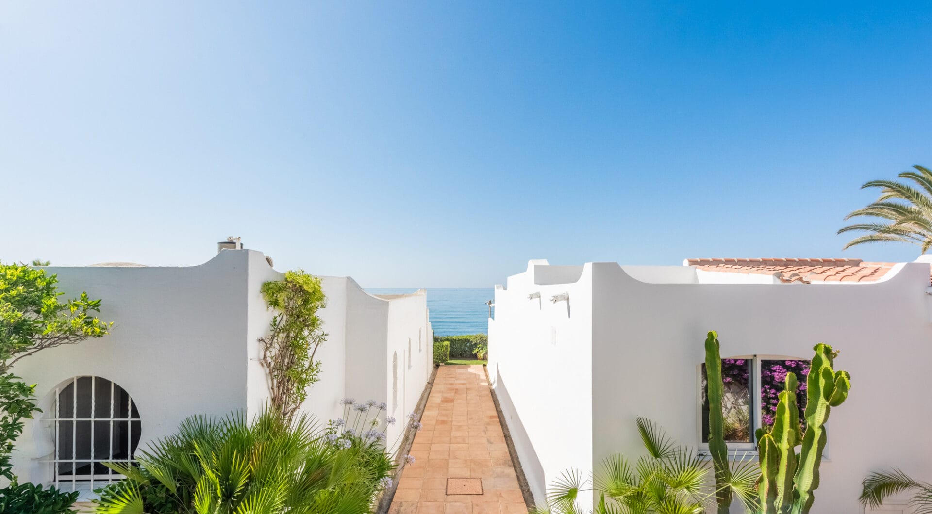 Scandi-style design bungalow in the beachfront Oasis Club on Marbella's Golden Mile.